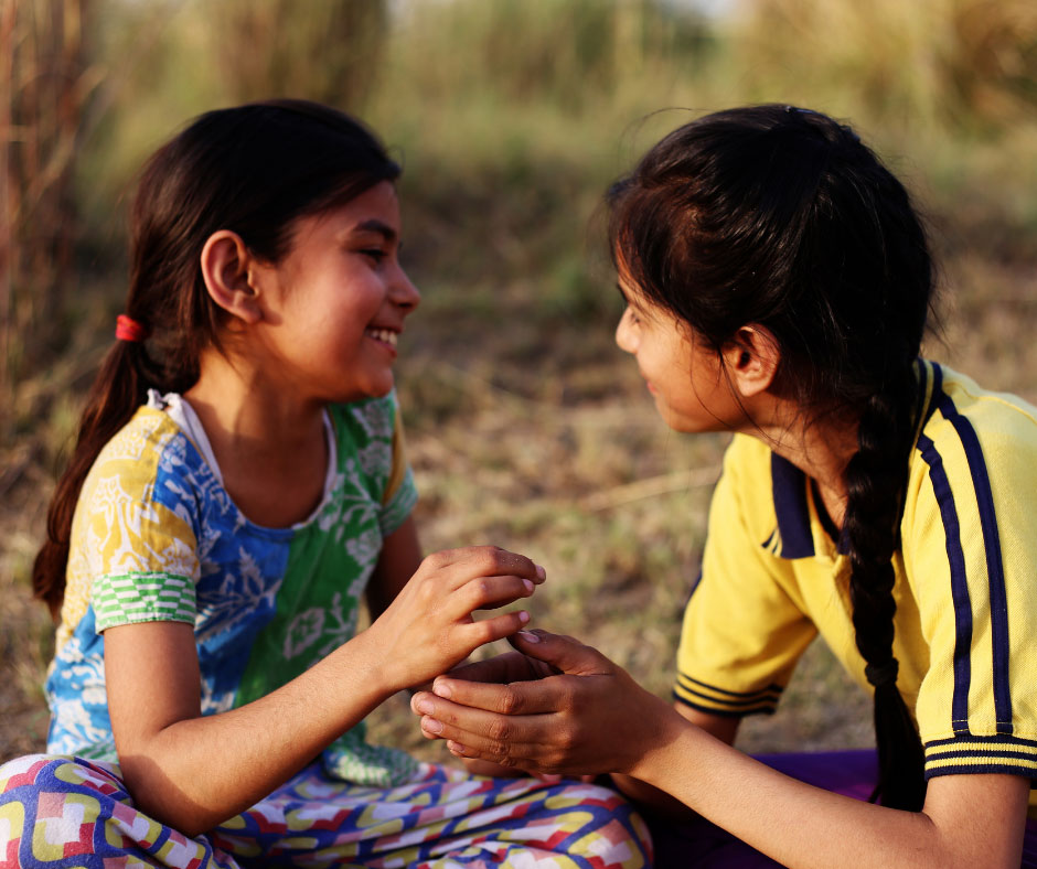 Parent and child playing outdoors