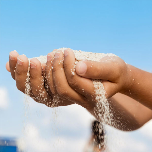 Hands filled with sand